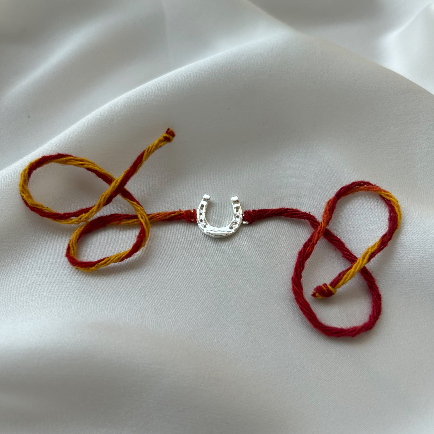 RAKHI - Good Luck HorseShoe  92.5 Silver Rakhi
