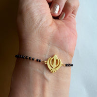 Women Khanda 22k Gold-plated Brass Bracelet with Black Onyx