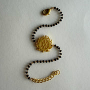 Women Sudarshan Chakra 22k Gold-plated Brass Bracelet with Black Onyx