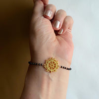 Women Sudarshan Chakra 22k Gold-plated Brass Bracelet with Black Onyx
